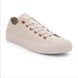 Tan leather converse with rose gold accents